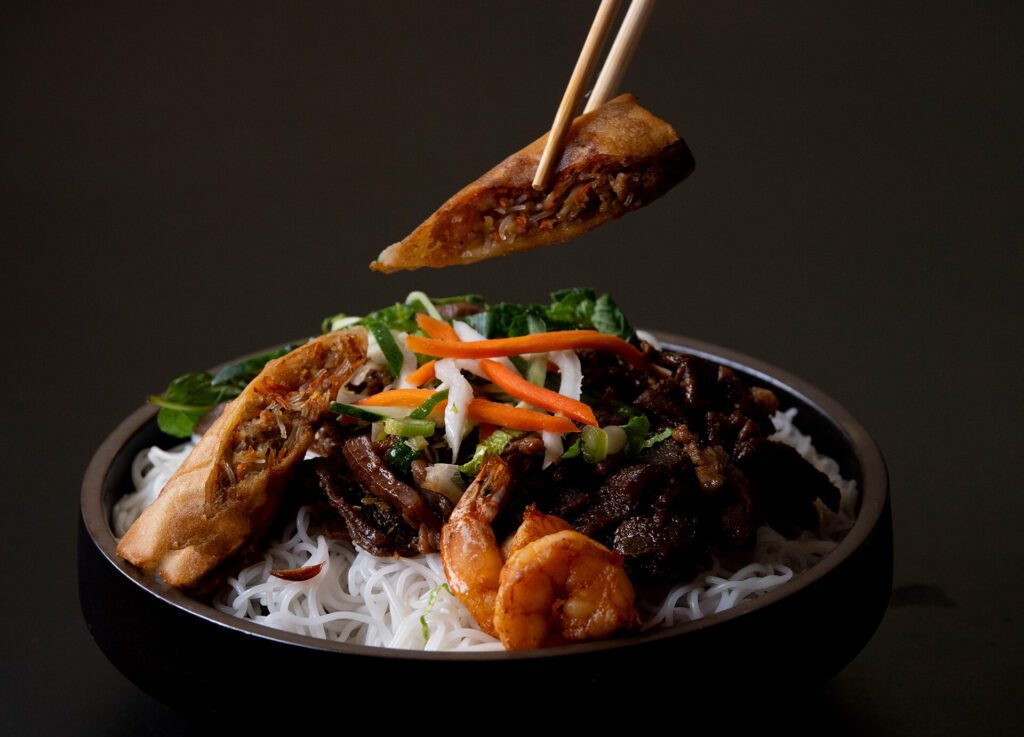 La V — vermicelli bowl with egg rolls, grilled beef, and shrimp